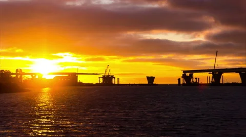 Beautiful sunset over bridge under construction Stock-Footage 56249656