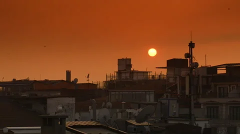 Beautiful sunset over the city Stockbeeldmateriaal 63044587