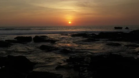 Beautiful Sunset Over Horizon Waves Bouncing Light Stock Footage 120519495