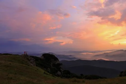 A beautiful sunset over a mountain range Stock Photos