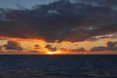 Beautiful sunset over the ocean Stock Photos