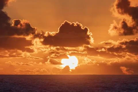 Beautiful sunset over the ocean Stock Photos