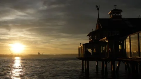 BEAUTIFUL SUNSET OVER OCEAN ON PIER 스톡 동영상 42391806