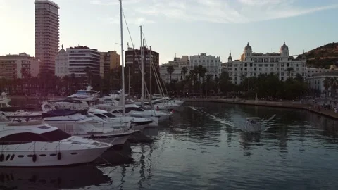 Beautiful sunset over port of Alicante city, Spain - aerial view Stock Footage 238803553