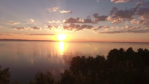 Beautiful sunset over the river and forest Stock Footage 78627683