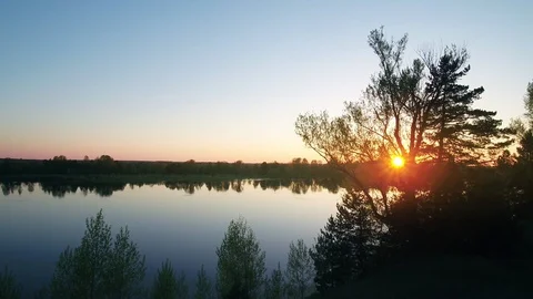 A beautiful sunset over the river Stock Footage 102951146