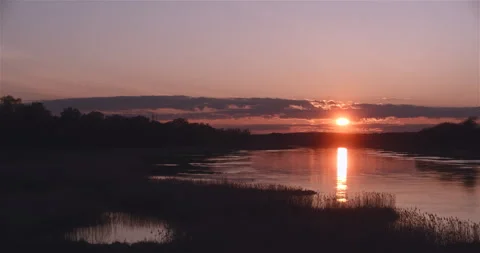 Beautiful sunset over the river Stock Footage 242788267
