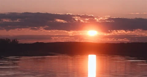 Beautiful sunset over the river Stock Footage 242788326