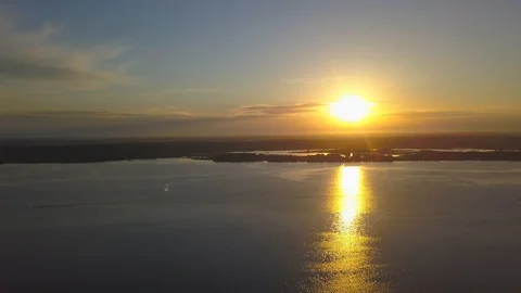 Beautiful sunset over the river. Panoramic. Aerial Stock Footage 112764317