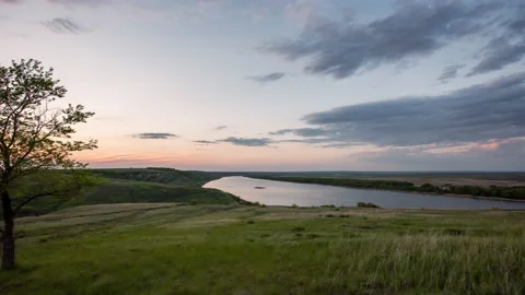 Beautiful sunset over the rolling hills. Relaxing nature timelapse. Stock Footage 169528461