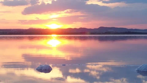 Beautiful sunset over the Salinas de Torrevieja salt lake Stock Footage 220147928