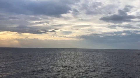 Beautiful sunset over the sea on a cloudy day Stock Footage 84167416