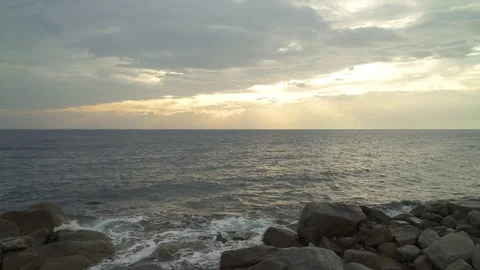 Beautiful sunset over the sea on a cloudy day Stock-Footage 84201458