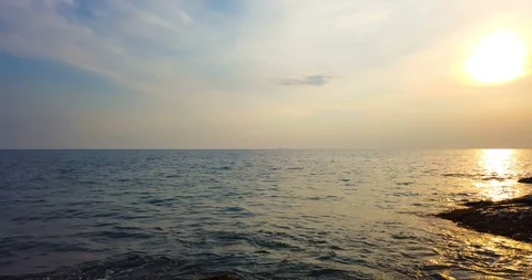 Beautiful sunset over sea with with dramatic sky Stock Footage 104742600