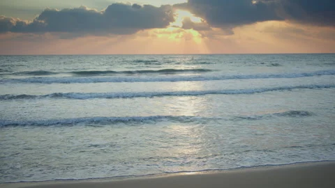 Beautiful sunset over the sea. Reflection of the setting sun on the seascape Stock Footage 314519419