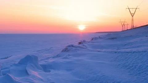 Beautiful sunset over snowbound sea 4K high resolution time lapse