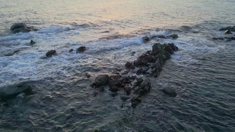 Beautiful sunset over some rocks in the sea in Sardinia Video stock 243837173