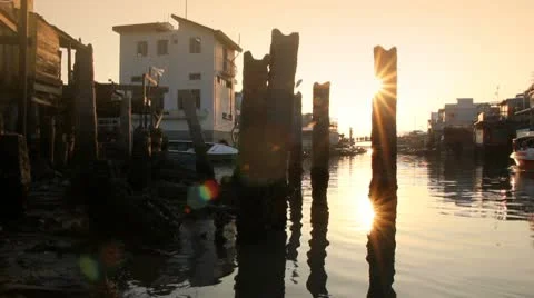 Beautiful sunset over Tai O fishing village in Hong Kong Stock Footage 9350121
