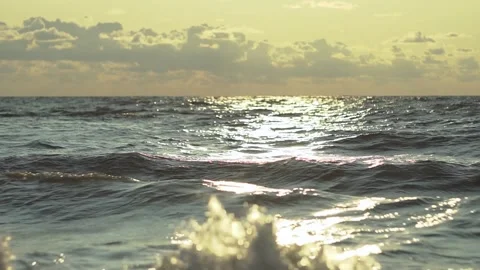 Beautiful sunset over the tranquil Baltic Sea waves at dusk Video stock 311865948