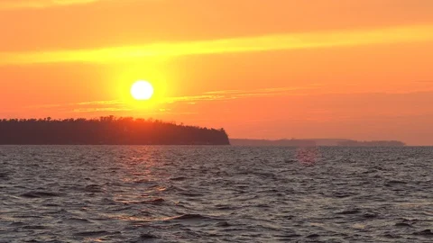 Beautiful Sunset over Water Stock Footage 103478082