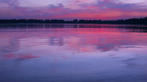 Beautiful sunset over the water surface of the river. Stock-Footage 115853856