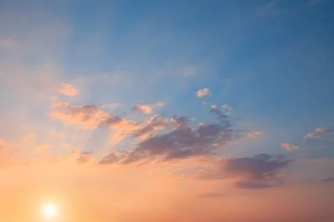 Beautiful sunset with the rays of the sun. Stock Photos