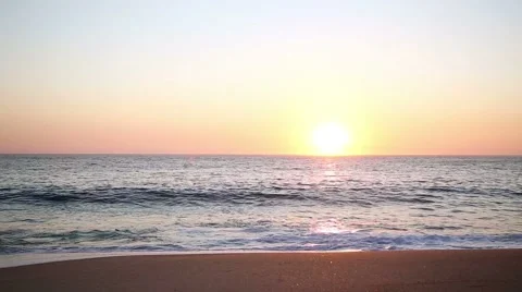 Beautiful sunset reflecting over the ocean Stock Footage 52370675