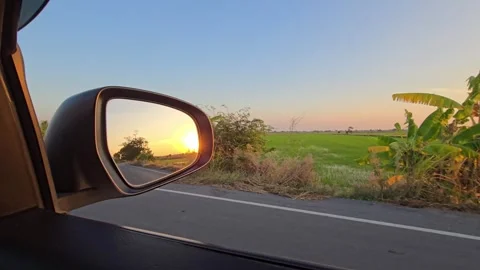Beautiful Sunset Reflection in Car Side Mirror at Rural. Video stock 327020860