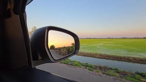 Beautiful Sunset Reflection in Car Side Mirror at Rural. Stock Footage 327020892