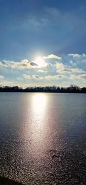 A Beautiful Sunset Reflection Over a Tranquil and Peaceful Lake at Dusk and Stock Photos