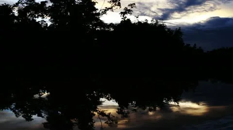 Beautiful sunset reflection on river Stock Footage 18191926