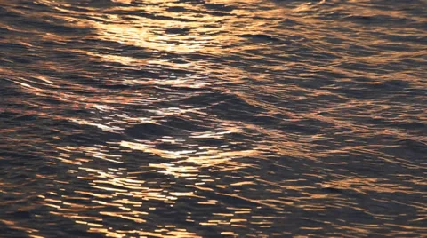 Beautiful sunset reflection sparkles on tiny ripples of sea water wave 스톡 동영상 37845384