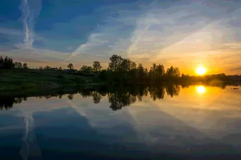 Beautiful sunset on the river. Stock Photos