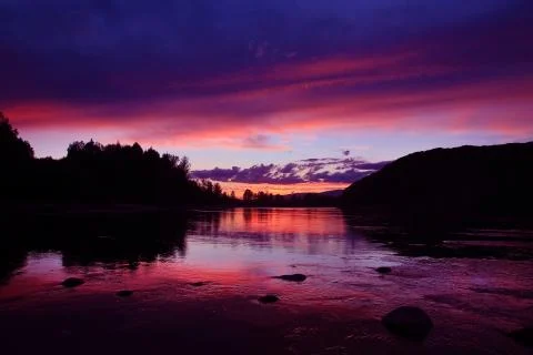 Beautiful sunset on the river Stock Photos