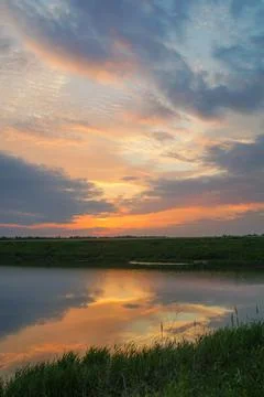 Beautiful sunset on the river Stock Photos