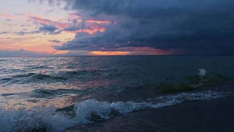 Beautiful sunset sea with dramatic cloudy sky. Stock Footage 249639456