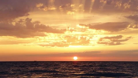Beautiful sunset on the sea, orange clouds Video stock 291327602
