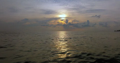 A beautiful sunset on the sea is reflected by the sun Stock Footage 264765054