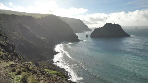 Beautiful Sunset Shining Through Clouds Off Atlantic Ocean Volcanic Rock Cliffs Stock Footage 89423647