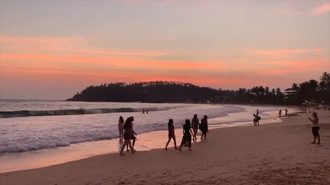 Beautiful sunset sky in the beach Vídeos de archivo 129755394