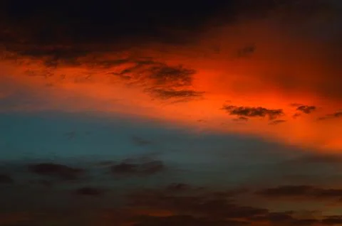 Beautiful sunset sky with clouds. Abstract sky. Stock Photos