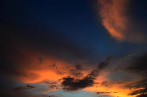 Beautiful sunset sky with clouds. Abstract sky. Stock Photos