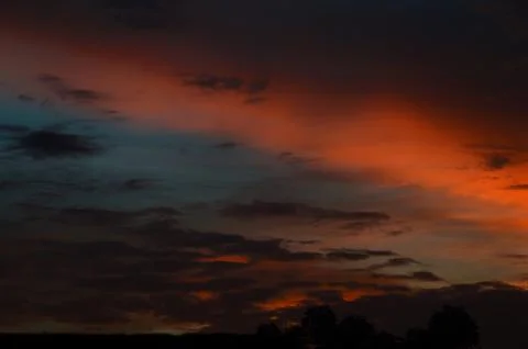 Beautiful sunset sky with clouds. Abstract sky. Stock Photos