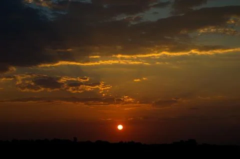 Beautiful sunset sky with clouds. Abstract sky. Stock Photos