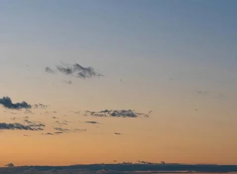 Beautiful sunset sky with clouds over horizon Stock Photos