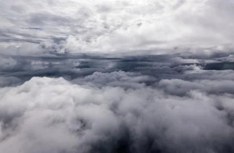 Beautiful sunset sky clouds  seeing through the airplane windows. Foto stock