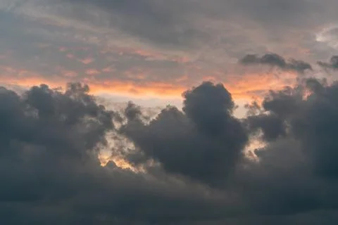 Beautiful sunset sky. Clouds at sunset. Big pink clouds, panoramic view Stock Photos