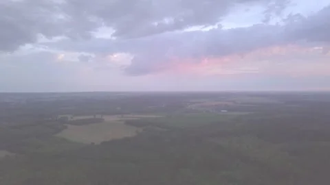 Beautiful sunset sky over fields and forest of Poland. Aerial landscape. Stock Footage 278413934