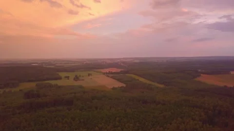 Beautiful sunset sky over fields and forest of Poland. Aerial landscape. Stock Footage 278413999