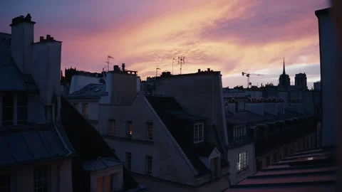 Beautiful sunset sky over rooftops of paris Stock Footage 346990264